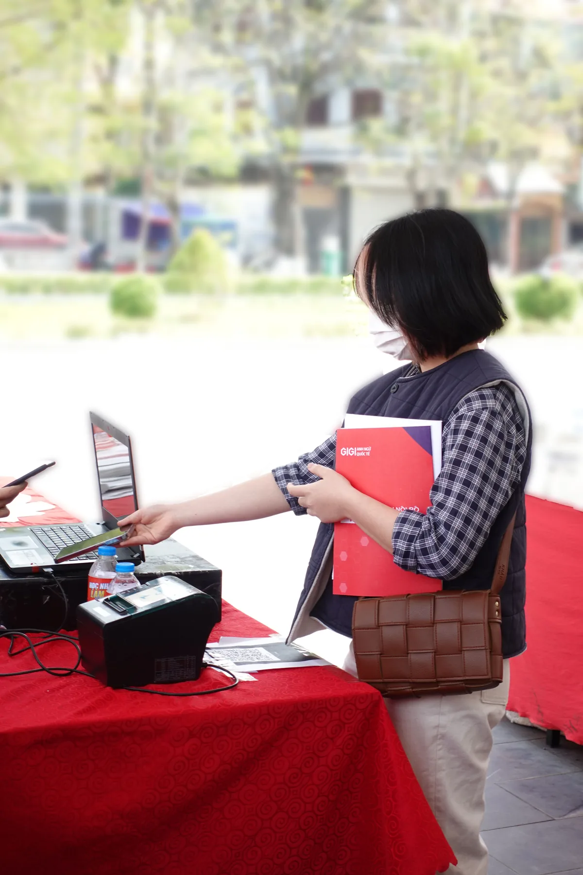 A volunteer working the stall desk.